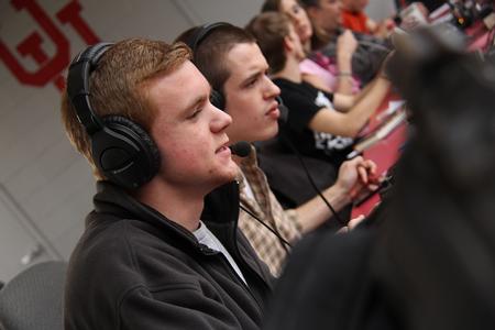 Grant Braden, Senior Broadcast Journalism major, calls the Bulldogs baseball game against the Freed-Hardeman Lions. - Photo by Matt McDaniel