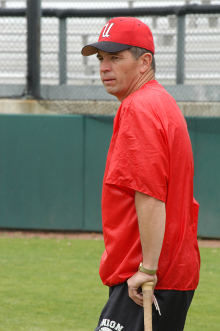 Baseball head coach Andy Rushing surveys the field during practice. - Photo by Lindsay Stavish
