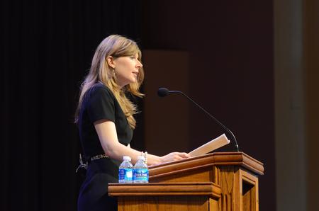 Autumn Ridenour, teaching assistant at Boston College, talks in Union chapel about St. Augustine.  - Photo by Matt McDaniel