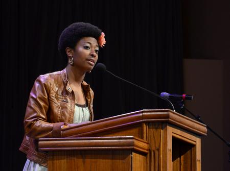 Melanie Taylor, senior sports management major, talks about the ways her team learned from the New Orleans culture during GO Trip Reports chapel. - Photo by Jacob Moore
