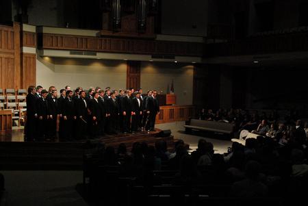 The men's choir performs at First Baptist Church during the Spring Choral Concert. - Photo by Anne Richoux