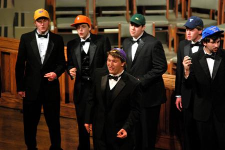 The men's choir performs at First Baptist Church during the Spring Choral Concert. - Photo by Anne Richoux