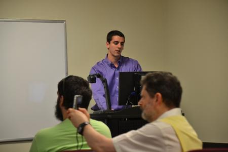 Jamie Fox, sophomore mathematics major, presents his Scholarship Symposium project, Dawson's Dream, which is a mathematical game app for mobile devices. - Photo by Olivia Wallace