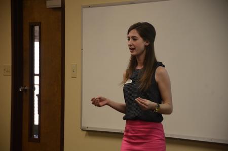 Sarah Hill, senior business administration major, presents her research for the 10th annual Scholarship Symposium. - Photo by Matt McDaniel