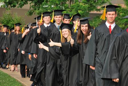 Engineering graduates celebrate as they walk toward the Great Lawn for Spring Graduation. - Photo by Anne Richoux