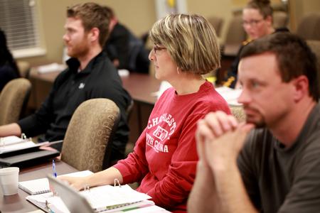 Adult studies students listen during a class in the Center for Continuing and Professional Studies.  - Photo by Kristi McMurry Woody