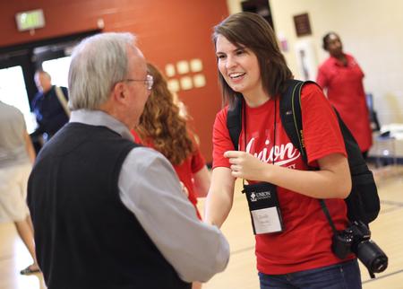 Emily Stookey, freshman, meets David S. Dockery, president of the university, at the ice cream social in the Bowld Student Commons. - Photo by Matt McDaniel