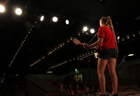 Jessica Chandler, freshman music business major, sings to a packed out Barefoots Joe crowd during freshman open mic night.  - Photo by Matt McDaniel