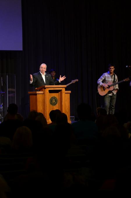 David S. Dockery, president of the university, welcomes new students and their families to campus during the chapel service held after new student move-in day. - Photo by Anne Richoux