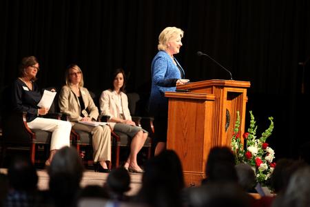 Sheila Mitchell, dean of the school of pharmacy, welcomes pharmacy students and their families to the annual white coat ceremony.  - Photo by Kristi McMurry Woody