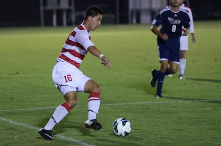 Cody Styx, senior business administration major, saves the ball from going out of bounds during a game against Lee University, which ended in a 1-1 tie.  - Photo by Matt McDaniel