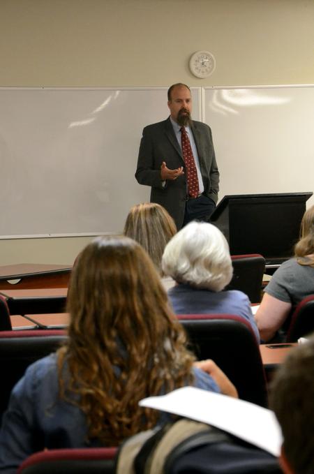 Micah Watson, director of the center for politics and religion, introduces the speaker for the Constitutional Day Lecture, Adam Mcleod.  - Photo by Anne Richoux