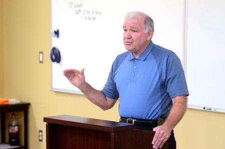 Dr. Clyde Smith, oncologist at Jackson and Madison County General Hospital, speaks in the Town and Gown lecture series "Christian Perspectives on Death and Dying" in Providence Hall. - Photo by Amanda Rohde
