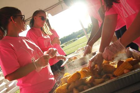 The ladies of Zeta Tau Alpha put together the boxes for a shrimp boil at Union Night. - Photo by Matt McDaniel