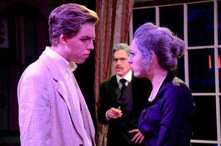 Garyn McIntyre, freshman theatre and psychology double major, Peter Riggs, senior philosophy major, and Allison Hearn, senior theatre major, perform "Magic: A Fantastic Comedy" by G.K. Chesterton in the W.D. Powell Theatre. - Photo by Amanda Rohde