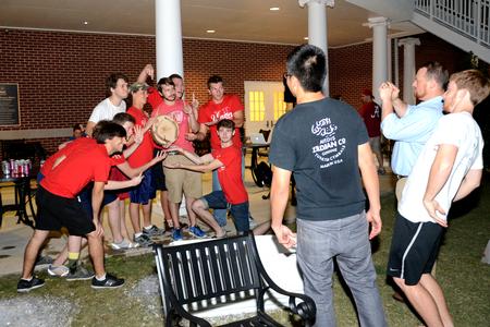 The men of Jarman pose for a photo and celebrate after winning the Great Outdoors competition in the Grace Quad. - Photo by Amanda Rohde
