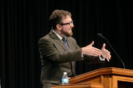 Taylor Worley, assistant vice president for university ministries, speaks on the importance of the gospel in Dietrich Bonhoeffer’s sermons in chapel. - Photo by Amanda Rohde