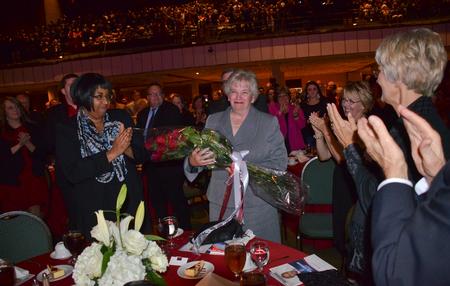 Lanese Dockery smiles as her husband David S. Dockery, president of the university, thanks her for her support and love during their eighteen years at Union University. - Photo by Morris Abernathy