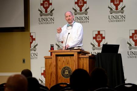 Brad Green, associate professor of Christian thought and tradition, speaks on the recovery of true education at the Aslan's Apologist Town & Gown lecture series. - Photo by Anne Richoux