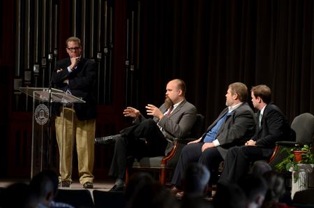 Hunter Baker, dean of instruction and associate professor of political science, moderates a panel on religious liberty in the G.M. Savage Memorial Chapel. Also pictured are panel participants, Micah Watson, director of the Center for Politics and Religion and associate professor of political science; Ben Mitchell, Graves Professor of Moral Philosophy; and Andrew Walker, director of policy studies for the Southern Baptist Ethics & Religious Liberty Commission.  - Photo by Anne Richoux