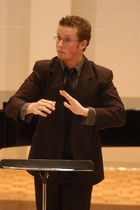 Senior Jeremy Warner, music major, leads the University Singers in gospel music during Union’s first scholarship symposium, Monday, May 3. - Photo by Kristen Nicole Sayres