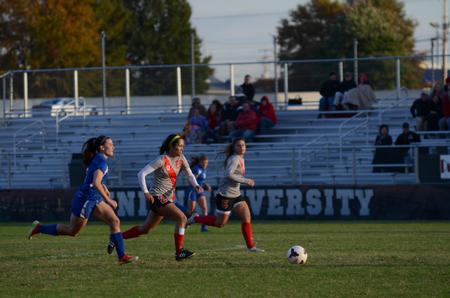 Lady Bulldog Sara Johnson races a University of Alabama-Huntsville player for the ball during a game at the Smith Memorial Soccer Complex.  - Photo by Anne Richoux