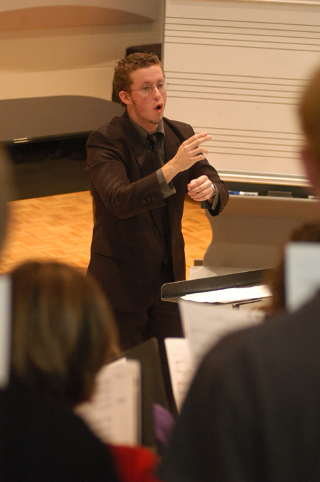 Senior Jeremy Warner, music major, leads the University Singers in gospel music during Union’s first scholarship symposium, Monday, May 3. - Photo by Kristen Nicole Sayres