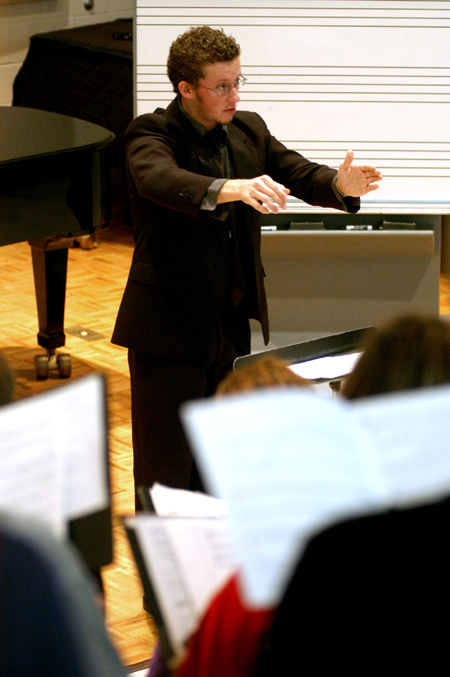 Senior Jeremy Warner, music major, leads the University Singers in gospel music during Union’s first scholarship symposium, Monday, May 3. - Photo by Kristen Nicole Sayres