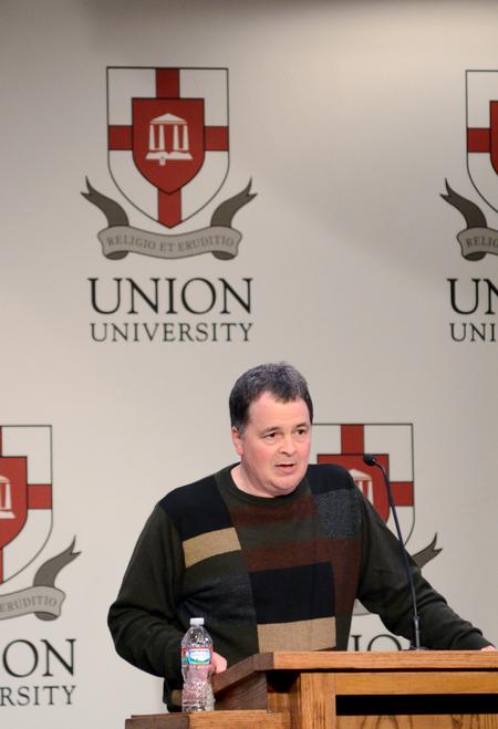 Matt Lunsford, professor of mathematics, speaks on "The Mathematical Mind of C.S. Lewis" during the Aslan's Apologist Town & Gown lecture series.  - Photo by Anne Richoux