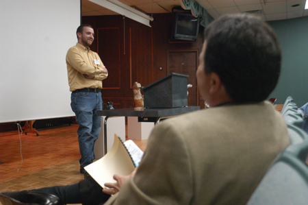 Senior Brian Bain, art major, presents "Developing Forms in Clay" during the university's first scholarship symposium. - Photo by Kristen Nicole Sayres