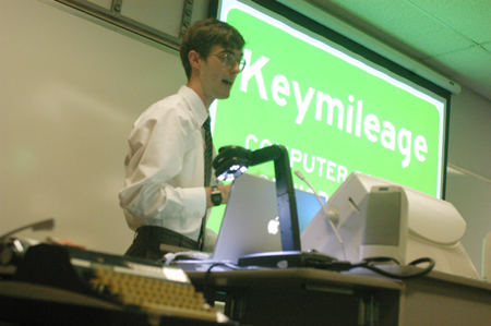 Senior Allen Smith, computer science & mathematics major, presents "Letting Your Fingers Do Too Much Walking: The Distance Traveled While Typing," a paper on the benefits of the Dvorak keyboard during the university's first scholarship symposium. - Photo by Lindsay Stavish