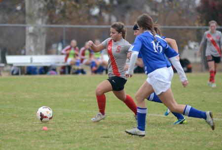 Lady Bulldog Kelsey Wilkes, freshman business administration major, chases the ball during a soccer game. - Photo by Amanda Rohde