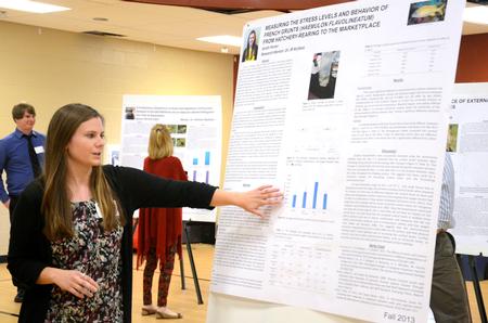 Sarah Porter, senior biology major with a concentration in zoology, presents her research at the third annual Fall Poster Session in the Bowld Student Commons.  - Photo by Anne Richoux