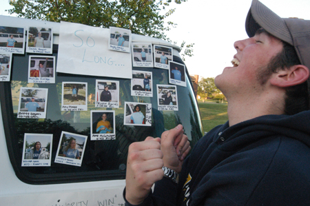 Freshman Justin Cook, philosophy major, celebrates his victory over his opponents after staying for more than 28 hours in the Road Trip to Nowhere van. - Photo by Jonathan Blair