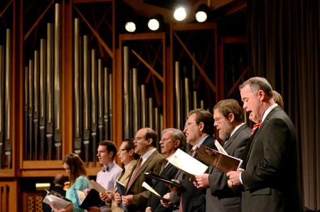 Speakers sing a hymn during a service of celebration and thanksgiving for David and Lanese Dockery. - Photo by Anne Richoux