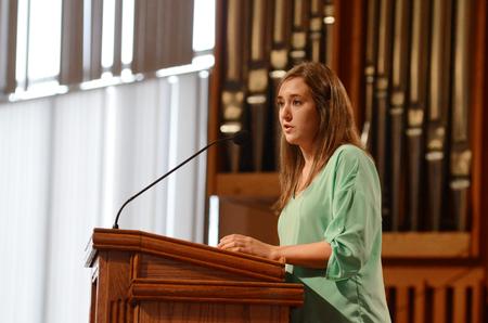 Savannah Hari, senior sports medicine major, expresses her thanks to the Dockerys during a service of celebration and thanksgiving. - Photo by Anne Richoux