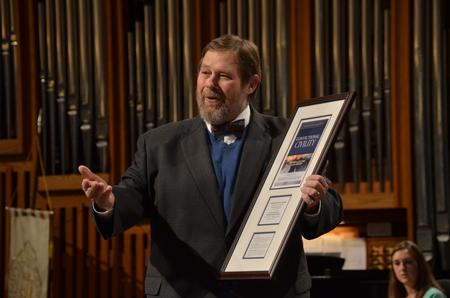 Ben Mitchell, Graves Professor of Moral Philosophy, speaks about the award of Convictional Civility presented to David S. Dockery during the service of celebration and thanksgiving for David and Lanese Dockery. - Photo by Morris Abernathy