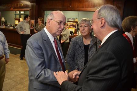 David S. Dockery, president of the university, greets Bob Agee following a chapel service of celebration and thanksgiving for the Dockerys. - Photo by Morris Abernathy