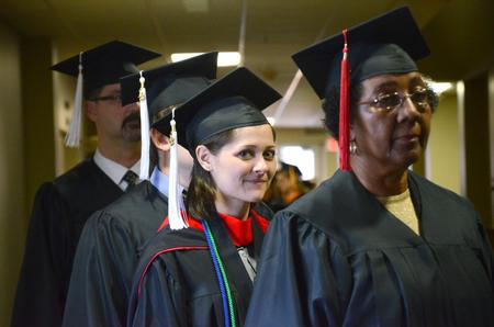 Ryan Edenfield, Biblical studies languages graduate, waits for the processional with other students at Fall Commencement Services. - Photo by Amanda Rohde