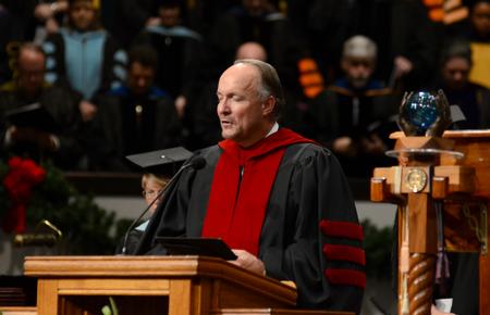 Jerry Tidwell, senior vice president for university relations and athletics, leads the invocation during Fall Commencement Services. - Photo by Jacob Moore