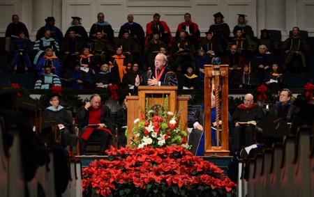 David S. Dockery, president of the university, welcomes a full house at the Fall Commencement Services held at West Jackson Baptist Church. - Photo by Jacob Moore