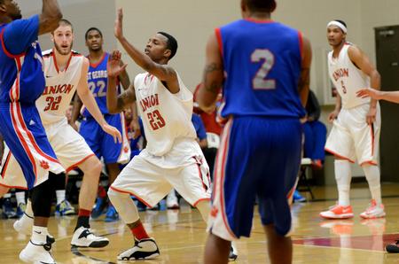 Bulldogs Eric Leisey and Corieon Pearson play defense against University of West Georgia.  - Photo by Anne Richoux