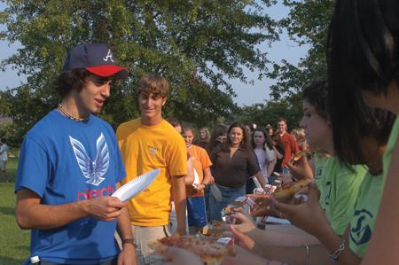 Freshmen Josh White, Ben Burleson, and others prepared to enjoy a SAC-sponsored pizza lunch during FOCUS 2003.

 - Photo by Kristen Nicole Sayres