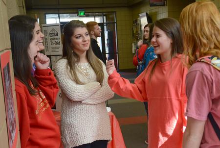 Members of Chi Omega talk with prospective students about their sorority at the Student Organizations Fair. - Photo by Amanda Rohde