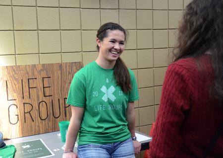 Morgan Morfe, sophomore psychology major, tells a prospective student about Life Groups at the Student Organizations Fair. - Photo by Amanda Rohde