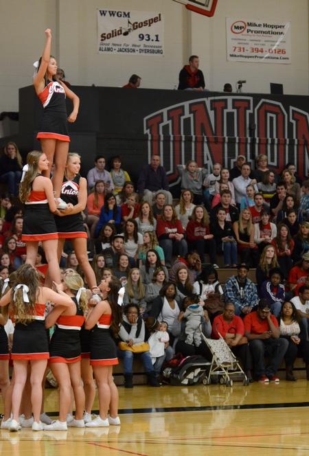 Cheerleaders entertain the crowd during a timeout of the homecoming game against Delta State.  - Photo by Anne Richoux