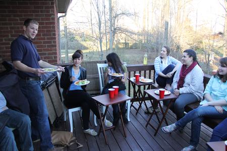 Blake Pennington, director of wellness services, tells a funny story during Be our Guest, where he and his wife hosted several students for dinner in their home.  - Photo by Matt McDaniel