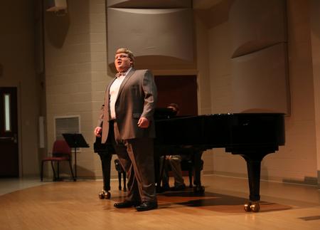 Adam Stanford, senior church music major, sings at his senior recital in the Hartley Recital Hall. - Photo by Amanda Rohde
