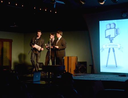 Caleb Shore, junior broadcast journalism major, receives an award for his work on the long-form film "Paradigm" at the 11th Annual Union Student Film Festival hosted by James Watlington, junior media communications major, and Sam Jones, freshman digital media studies major. - Photo by Amanda Rohde