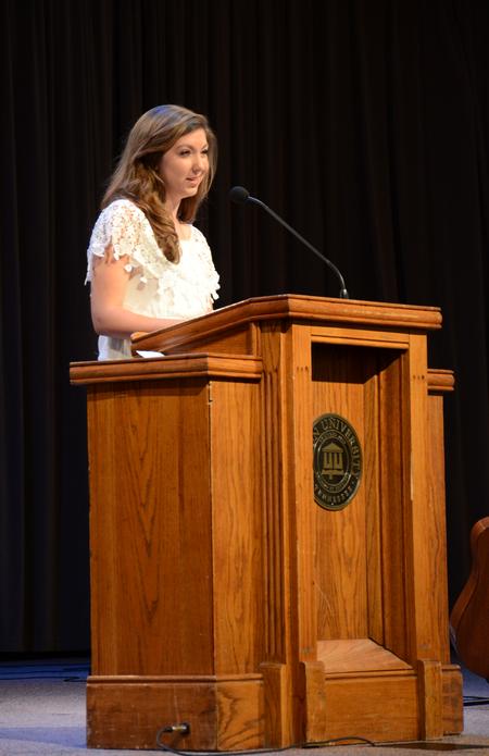 Student representative for the GO Trip to New York City over spring break, Katelyn Walls, sophomore Christian thought and tradition major, gives an expressionistic report of her team's experience. - Photo by MiKalla Cotton